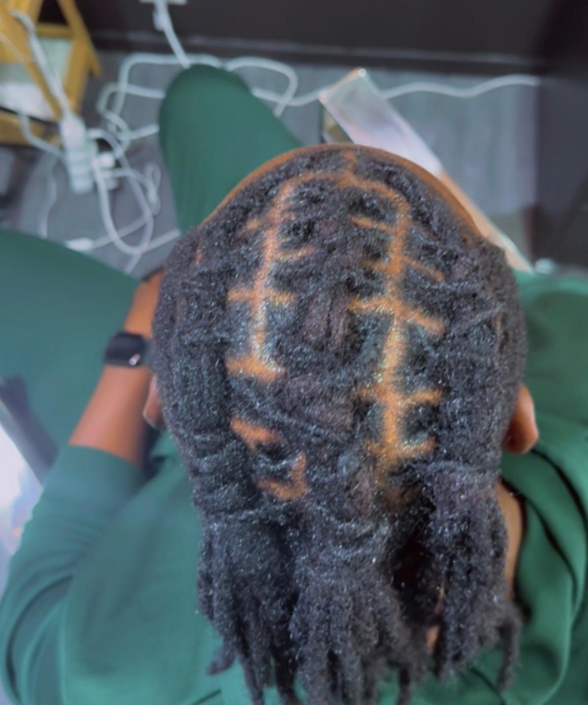Réalisation tressage — box braids longues bouclées
